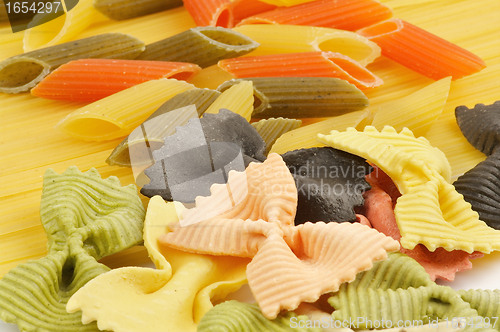 Image of Italian pasta spaghetti, Penne rigate tricolore and farfalle
