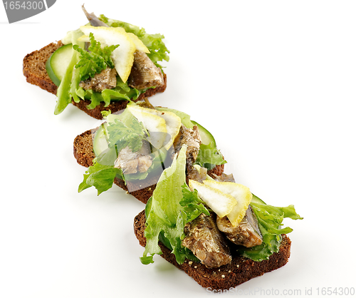 Image of Three smoked sardines sandwiches