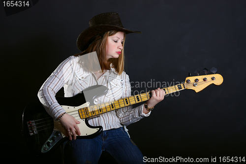 Image of Girl playing gutar
