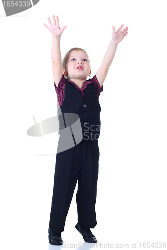 Image of Little boy move hands up