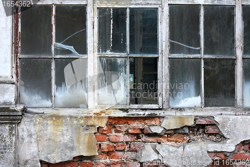 Image of Broken window at the wall