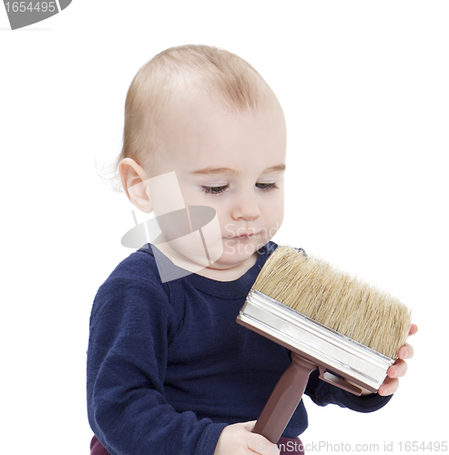 Image of young child with brush