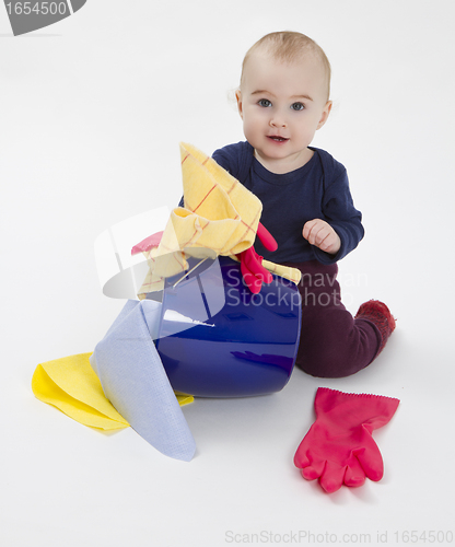 Image of toddler with bucket and floor cloth