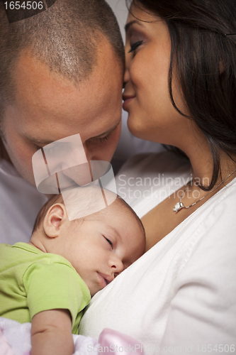 Image of Mixed Race Young Family with Newborn Baby