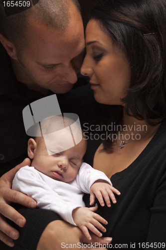 Image of Mixed Race Young Family with Newborn Baby