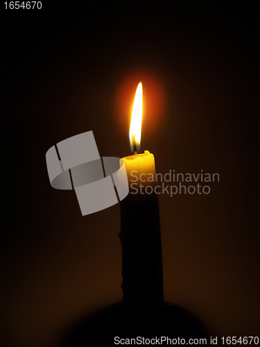 Image of burning candle