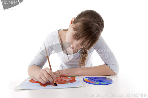 Image of Girl drawing color flower