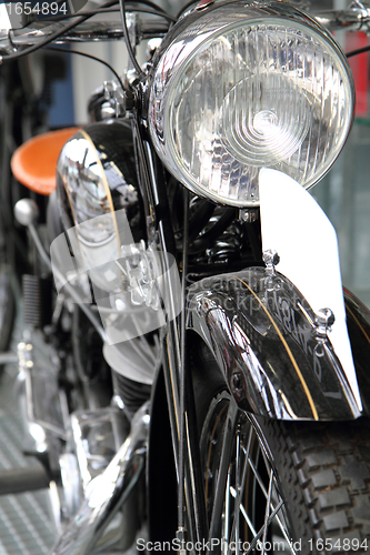 Image of detail of old motorbike