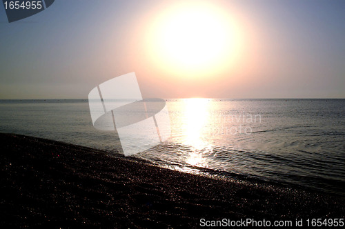 Image of sun over the sea