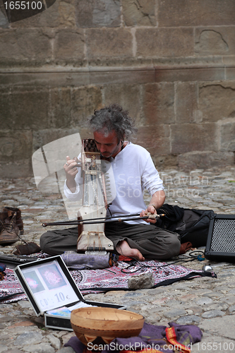 Image of Sarangi player