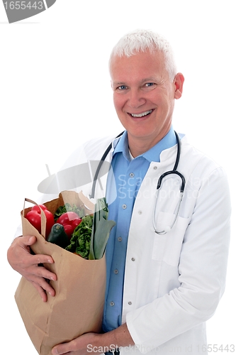 Image of Doctor with  vegetables in a bag