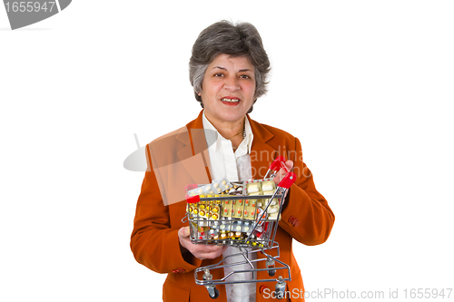 Image of Female senior with pills 