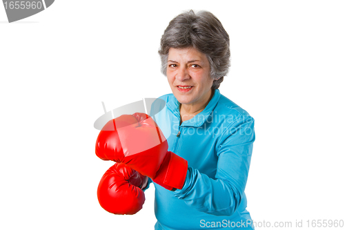Image of Female senior with boxing gloves