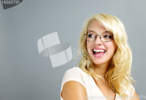 Image of Happy woman wearing glasses