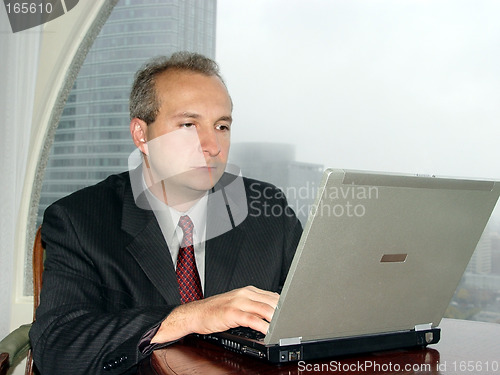 Image of Businessman with laptop