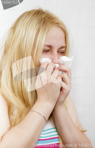 Image of cold blonde girl with the handkerchief