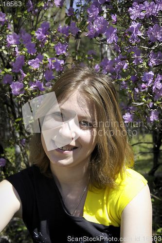 Image of Young woman and flowers