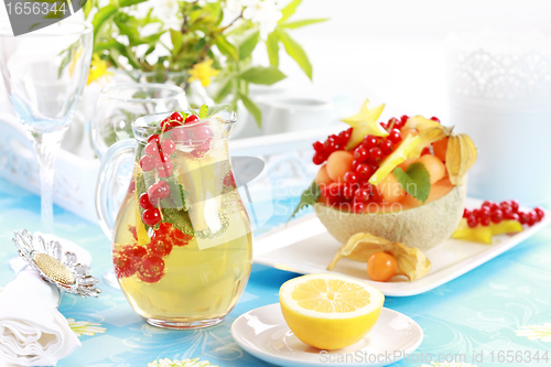 Image of Fresh fruits served in melon bowl