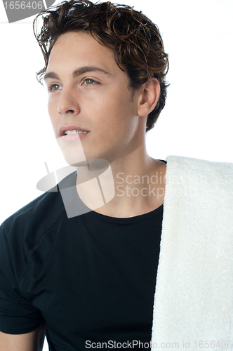 Image of Young handsome guy with towel, closeup shot