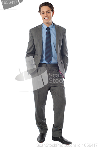 Image of Portrait of happy smiling young businessman