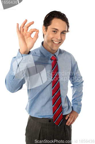 Image of Male executive gesturing great ok sign