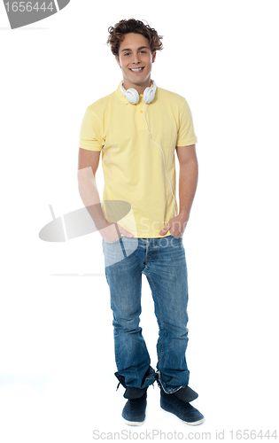 Image of Man portrait with headphones listening to music