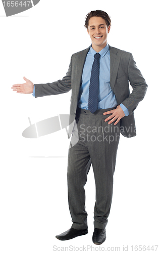 Image of Successful businessman presenting over white background