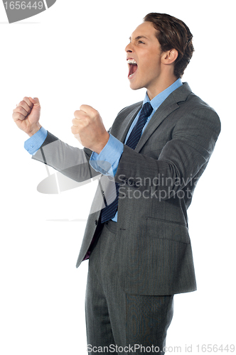 Image of Portrait of an excited businessman