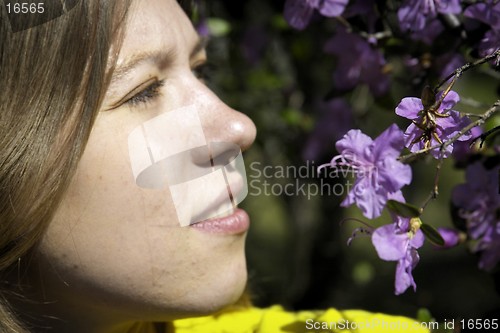 Image of Young woman and flowers