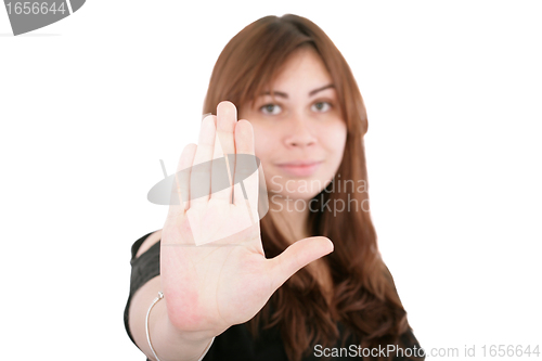Image of young woman making stop with his hand on white background 