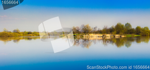 Image of Sky reflection on lake.