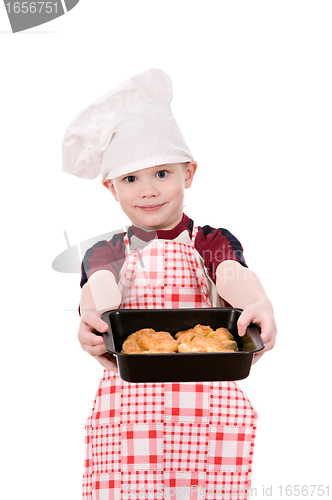 Image of boy in chef's hat with baking