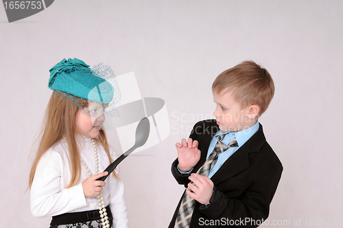 Image of girl with large spoon