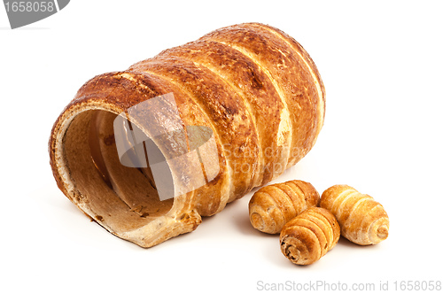 Image of Big and small empty Cannoli pastry