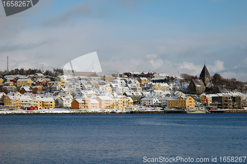 Image of new modern architecture at frozen riverside in winter