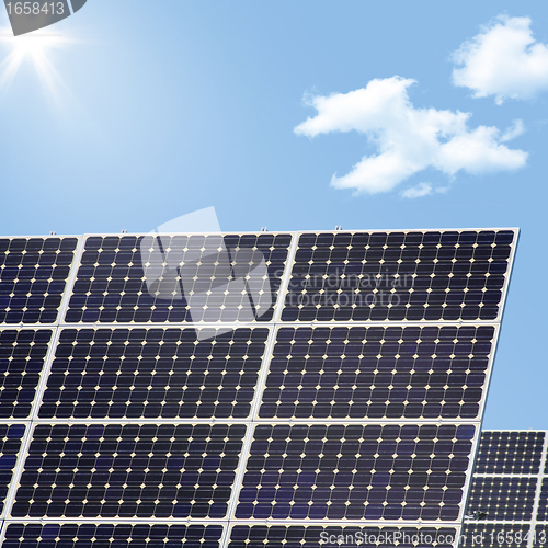 Image of  solar panel and sun  