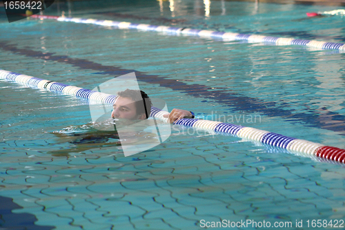 Image of swimmer makes a break