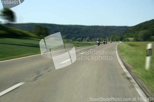 Image of biker on the road