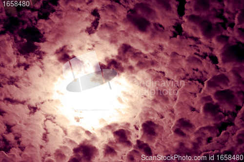 Image of Pink clouds at the black sky