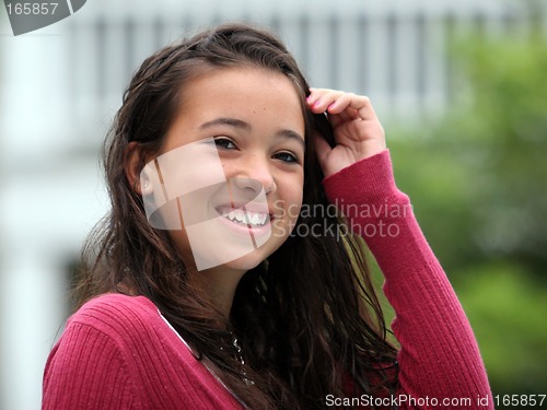 Image of Happy asian teen girl  smiling