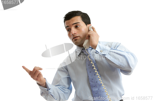 Image of Businessman in conversation on telephone