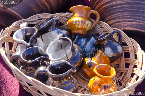 Image of Decorative handmade pottery jar sold market fair 
