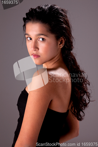 Image of beautiful latin woman, looking to camera