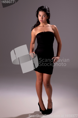 Image of beautiful woman with elegant black dress