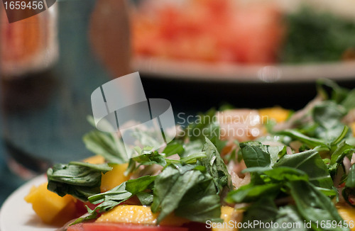 Image of Green salad with mango and tomatoes