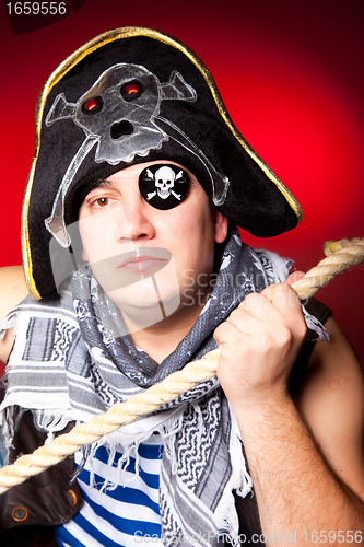 Image of pirate with a cocked hat and a rope