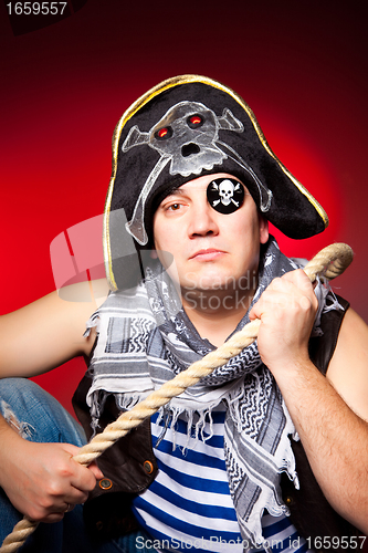 Image of one-eyed pirate with a cocked hat and a rope