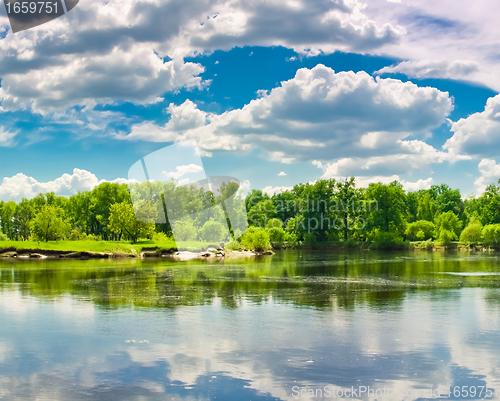 Image of Clouds reflection on lake.