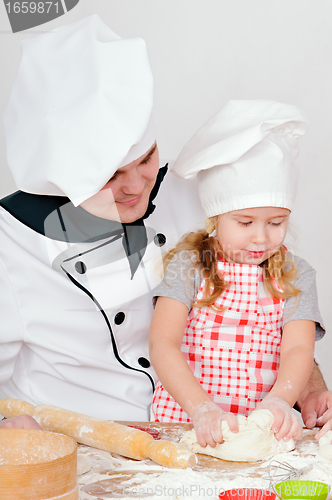 Image of chef with girl