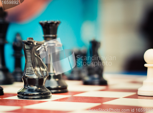 Image of Set of chess figures on the playing board